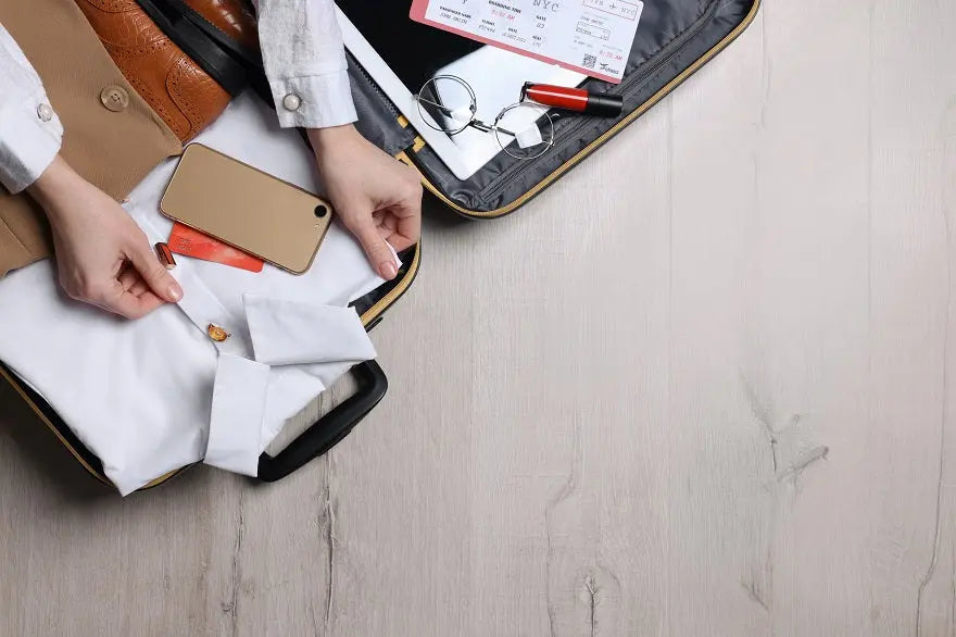 folding dress shirts in suitcase The Best Tips on How to Fold Shirts in a Suitcase