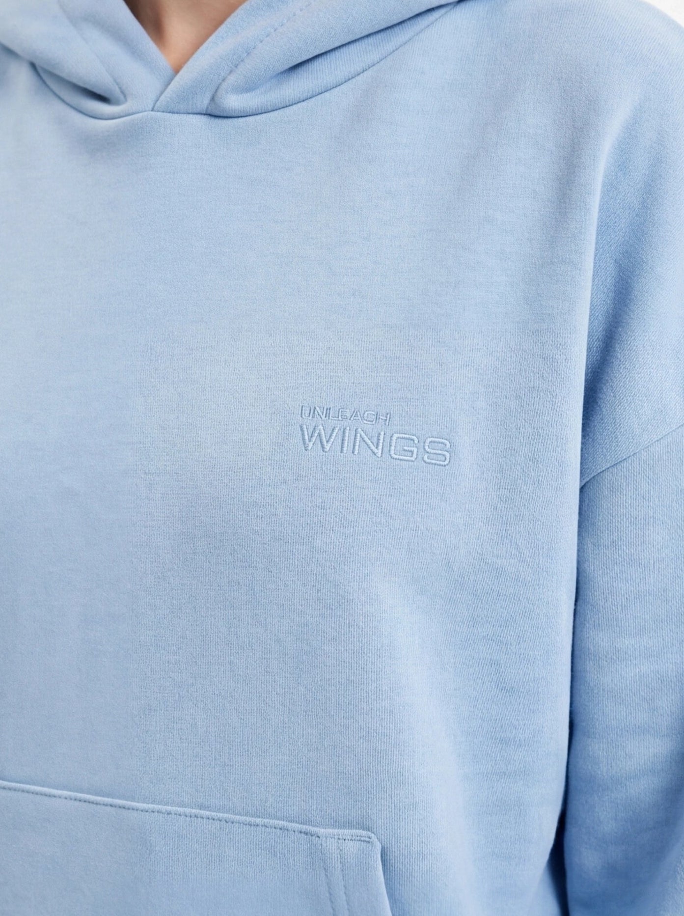 Damska bluza oversize UNLEASH WINGS PASTEL BLUE WINGS UNLEASH