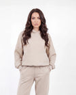 Oversized damtröja UNLEASH WINGS BEIGE
