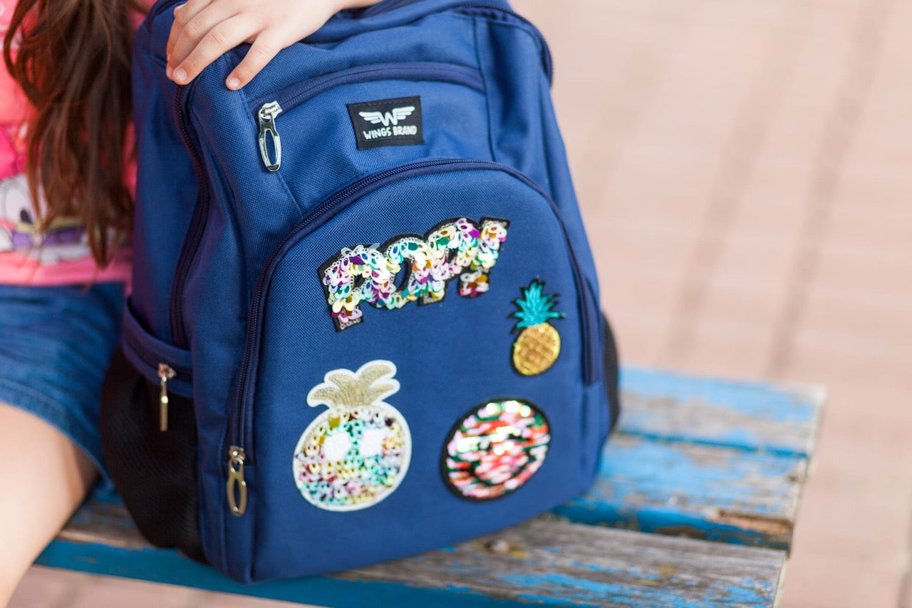 Mochila escolar infantil WINGS de 19 l con estuche y parches POPY